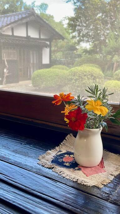 佐渡市 佐渡島に残る築130年の伝統的な古民家｜東夢ヴィラ エクステリア 写真